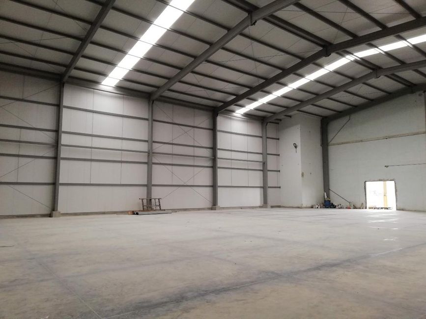 Proyecto Lavisa - Diseño, fabricación y montaje de 1,050m2 de Hangar tradicional con sistema constructivo Tubest - Construcción de 1050m2 de losa de concreto